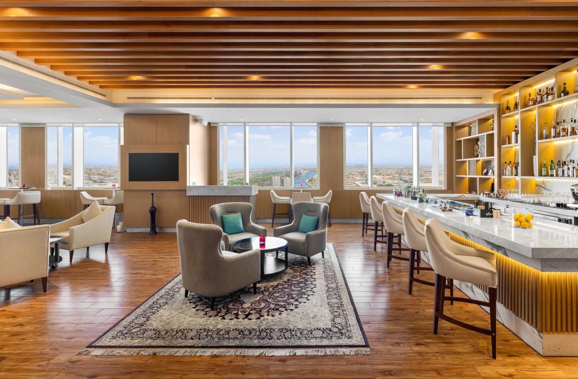 V Hotel Dubai, Curio Collection By Hilton Luaran gambar The Club Lounge at the hotel