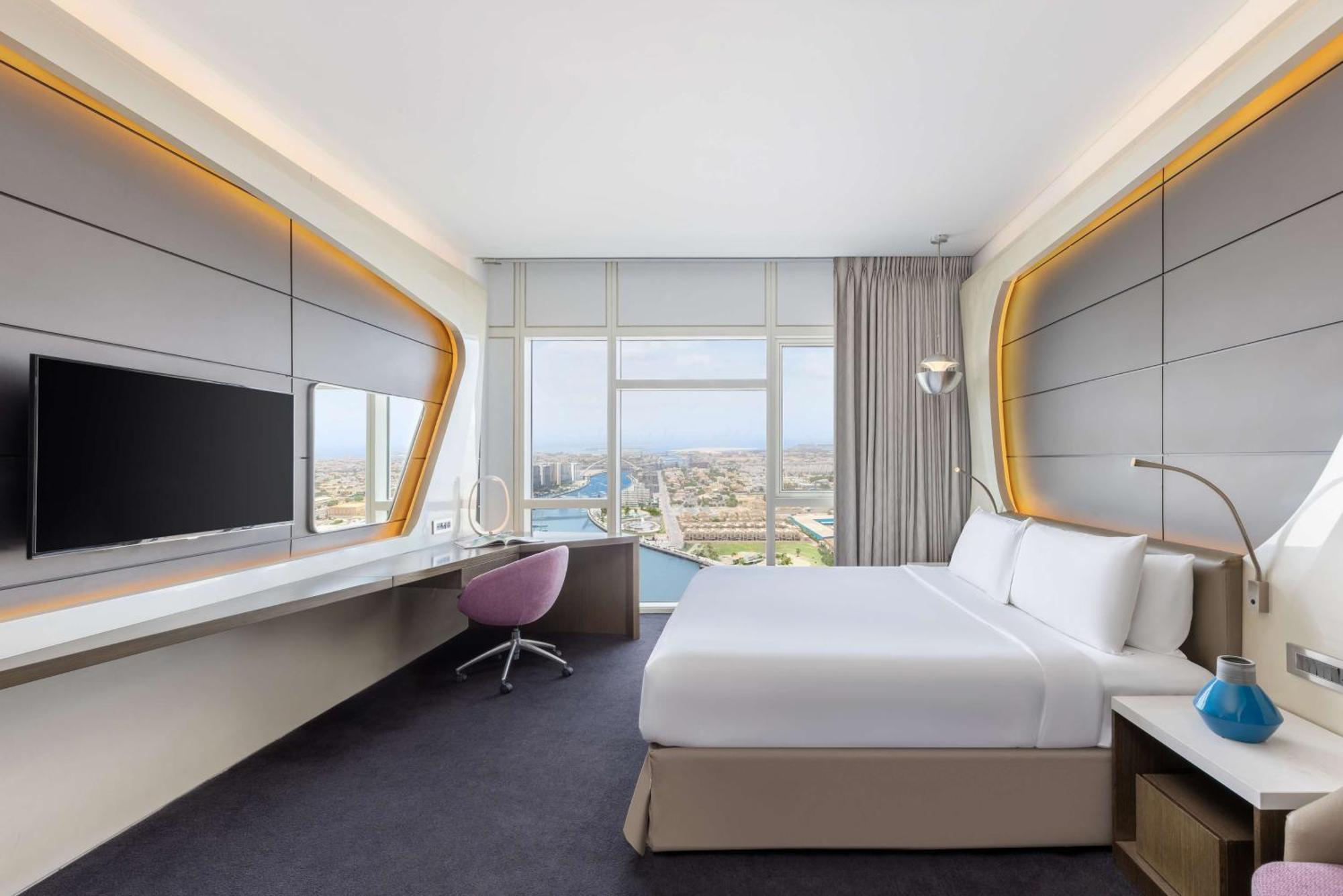 V Hotel Dubai, Curio Collection By Hilton Luaran gambar A room at the hotel