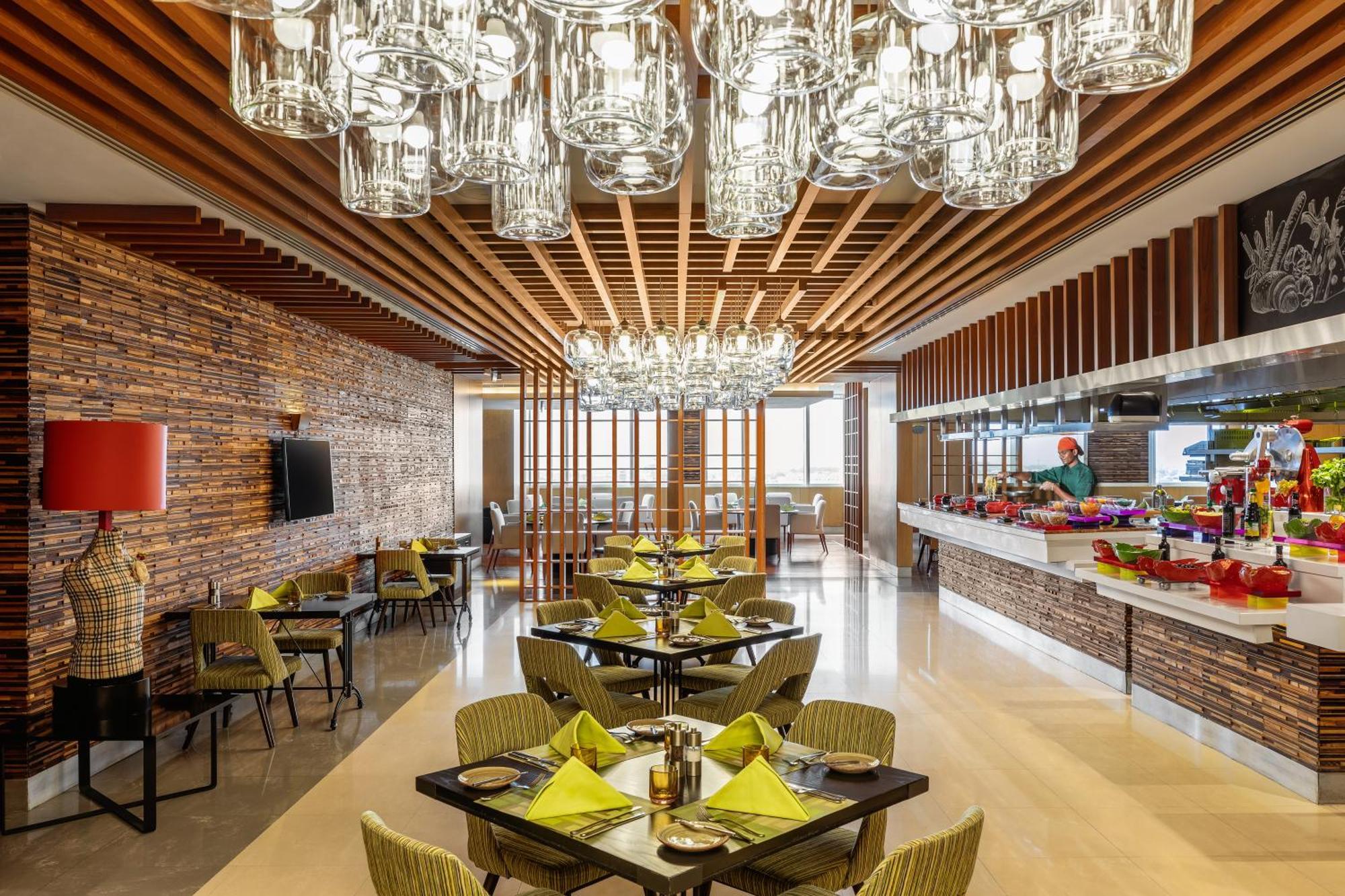 V Hotel Dubai, Curio Collection By Hilton Luaran gambar The restaurant