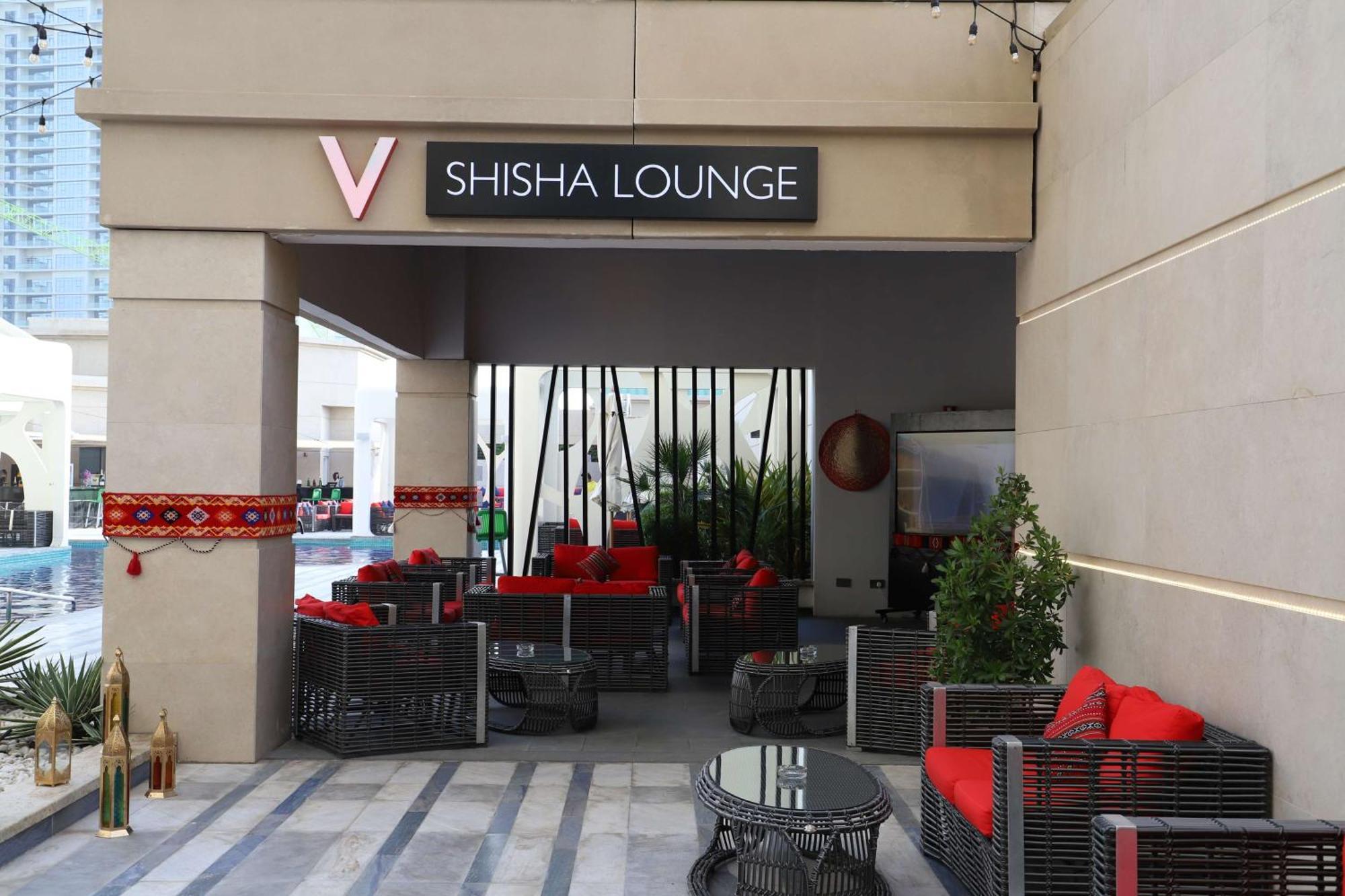 V Hotel Dubai, Curio Collection By Hilton Luaran gambar A shisha lounge in Dubai